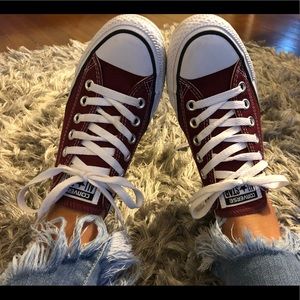 Maroon Converse Chuck Taylor shoes